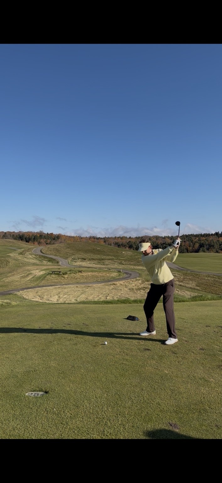 Mike Pike playing golf on the course